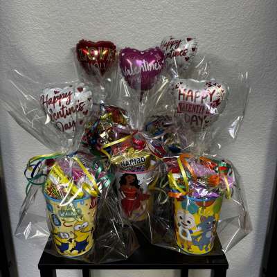 Valentine's Day candy gift baskets with heart balloons