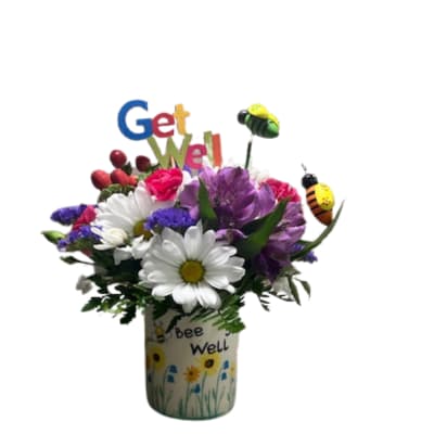 Mixed bouquet in a painted vase with a "Get Well" topper and bee decorations