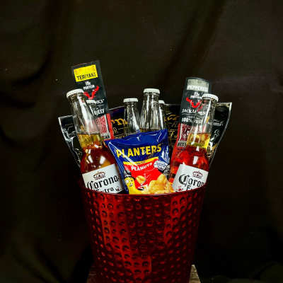 Gift bucket with beer bottles, jerky packs, and peanuts