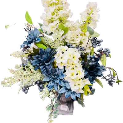 Blue and white floral arrangement in a vase
