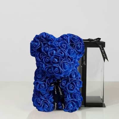 Blue rose teddy bear with a black gift box