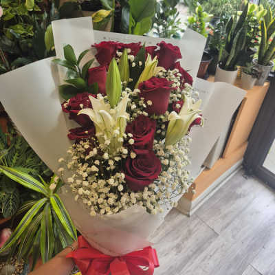 3 lilies and 12 red roses