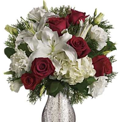 Red roses and white lilies in a silver vase