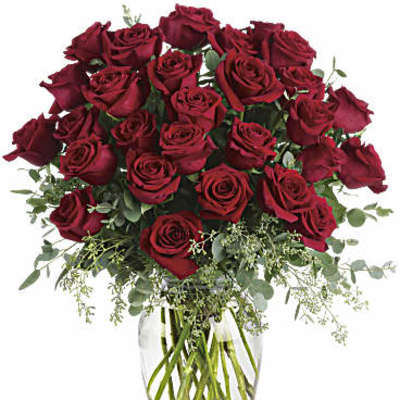 Bouquet of red roses in a clear glass vase