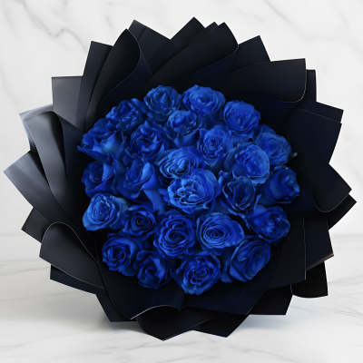 Bouquet of vivid blue roses wrapped in black paper