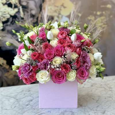 Pink and white rose bouquet in a lavender box