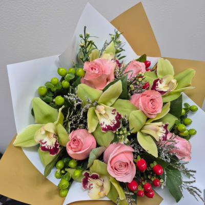 bouquet of roses with orchids