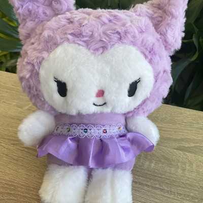 Lavender plush cat toy in a purple dress