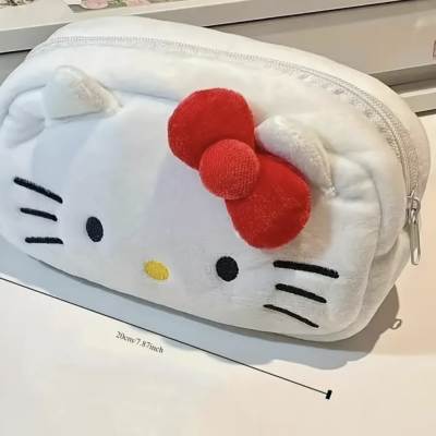 Hello Kitty-shaped zippered pouch with a red bow