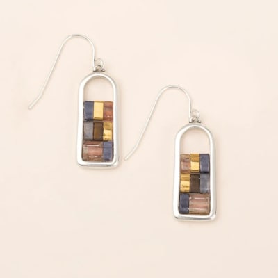 Pair of rectangular metal dangle earrings with multicolor mosaic inlay on a light background