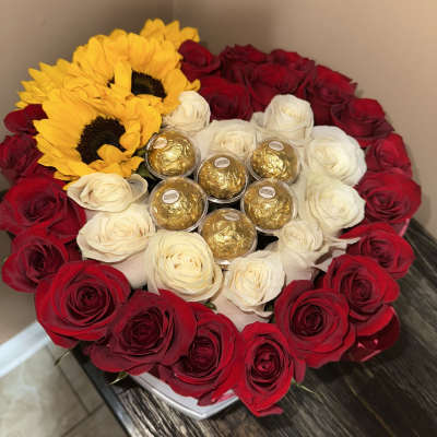 Bouquet of red and white roses with sunflowers and Ferrero Rocher chocolates