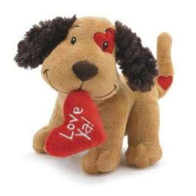 Brown plush puppy holding a red heart with 'Love Ya!' and red heart patches on its body.