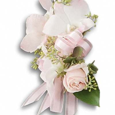 Pink and white floral corsage with ribbon