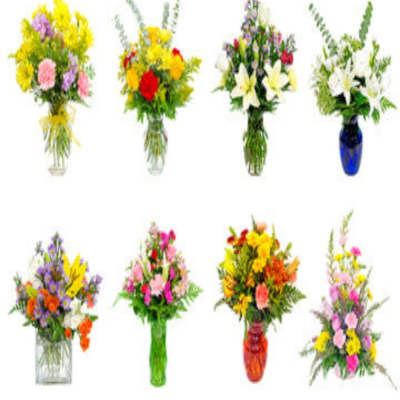 Assorted colorful flower bouquets in glass vases