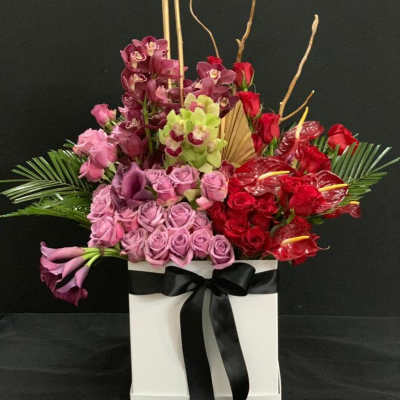 Luxurious Flower Bouquet with Roses, Flamingo Lily, Freesia & Crimson Cattleya