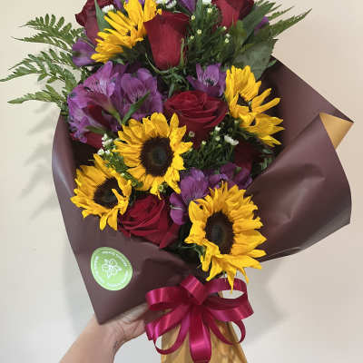 Wrapped Bouquet of 5 Sunflowers and Red Roses