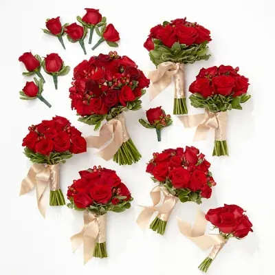 Assorted red rose bouquets and boutonnieres with cream ribbons