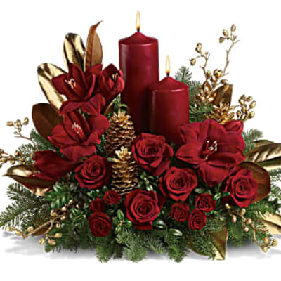 Red floral arrangement with candles and gold accents