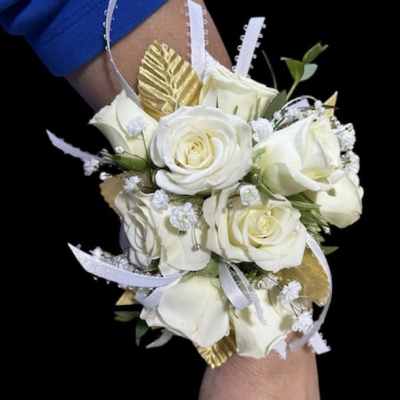 White rose wrist corsage with gold accents and white ribbon