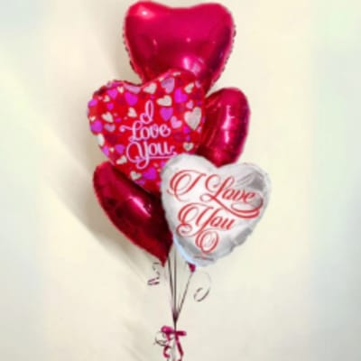 Heart-shaped Valentine balloons with "I Love You" text