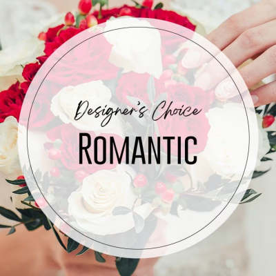 Romantic bouquet of red and white roses with red berries, overlaid with the words Designer's Choice Romantic