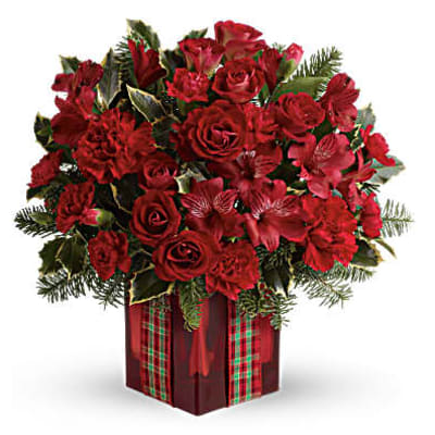Red roses and red flowers arranged in a gift box with plaid ribbon