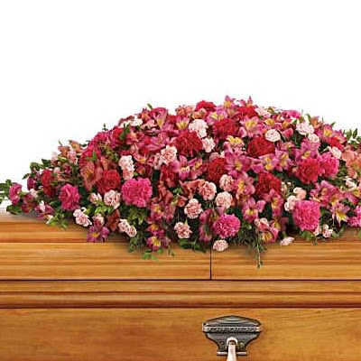Large pink and red floral casket spray