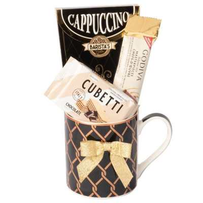 Gift mug filled with cappuccino and chocolate bars