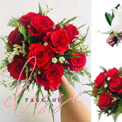 Red rose bouquet with greenery and small white filler flowers