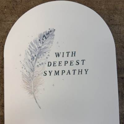 Arched white sympathy card with feather illustration and 'With Deepest Sympathy' text
