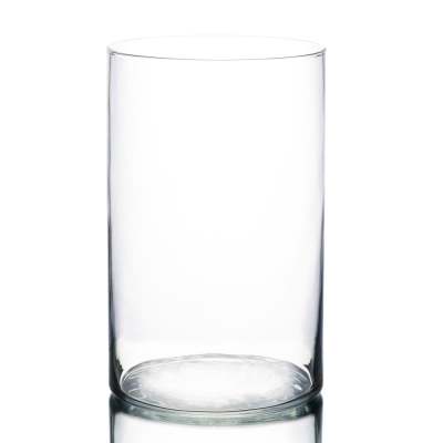 Clear cylindrical glass vase on a white background