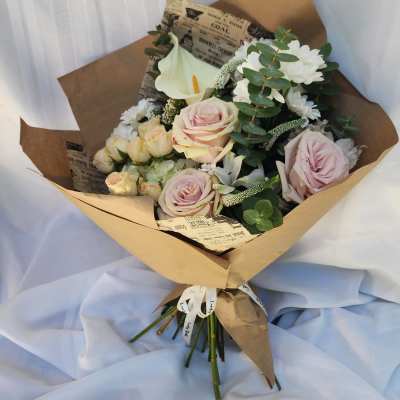 Pastel Paper Wraped Bouquet Designers Choice
