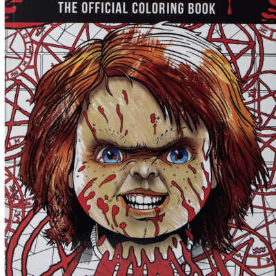 Horror coloring book cover with a doll face and red title text