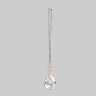 Beaded hanging ornament with gold accent and clear teardrop crystal pendant