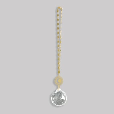 Hanging gold chain with round disc and faceted clear crystal drop ornament