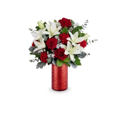 Red roses and white lilies in a red vase