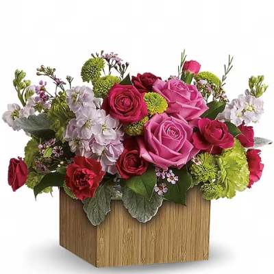 Pink and red rose arrangement in a wooden box