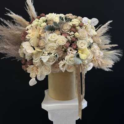 Box of cream and white roses