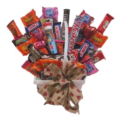 Candy bouquet in a white container with a heart-patterned bow
