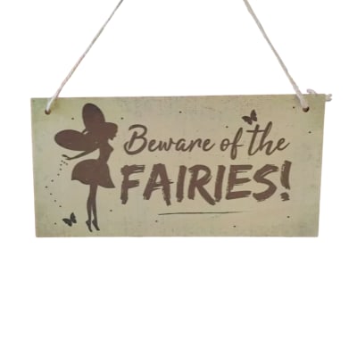 Hanging wooden sign reading "Beware of the Fairies!"