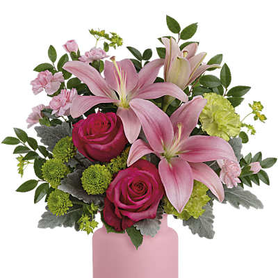 Pink lilies and roses in a pink vase