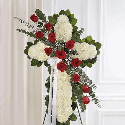 Cross-shaped floral standing spray with red roses and white mums