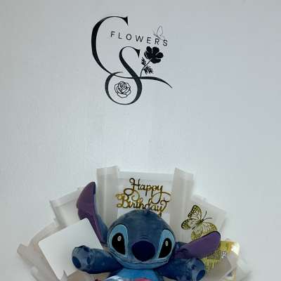 Blue plush toy bouquet with silk roses and birthday topper