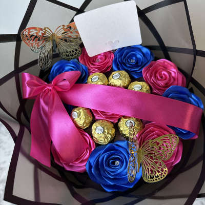 Bouquet of satin ribbon roses with Ferrero Rocher chocolates and butterfly accents