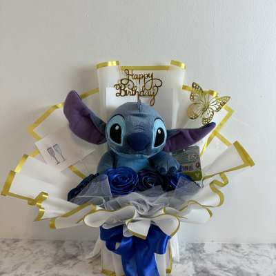 Blue plush Stitch gift bouquet with a Happy Birthday topper