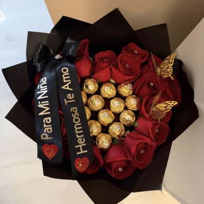 Red rose bouquet with Ferrero Rocher chocolates and black ribbon