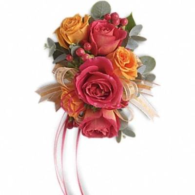Pink and orange rose bouquet with ribbon and berries