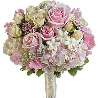 Pink and cream rose bouquet with white blossoms and hydrangea