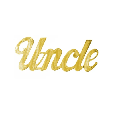Gold script word "Uncle" on a white background