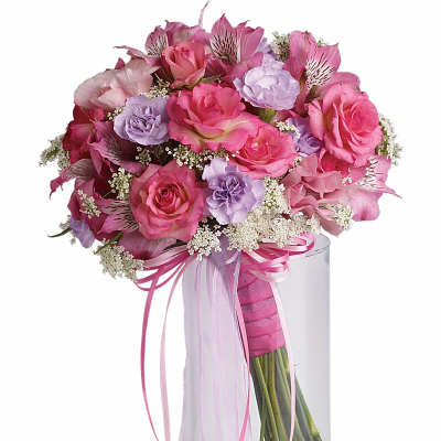 Pink and lavender bouquet in a clear glass vase with ribbon